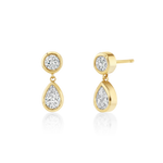 Gold earrings with teardrop-shaped gemstones on a white background