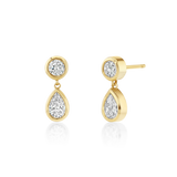 Gold earrings with teardrop-shaped gemstones on a white background