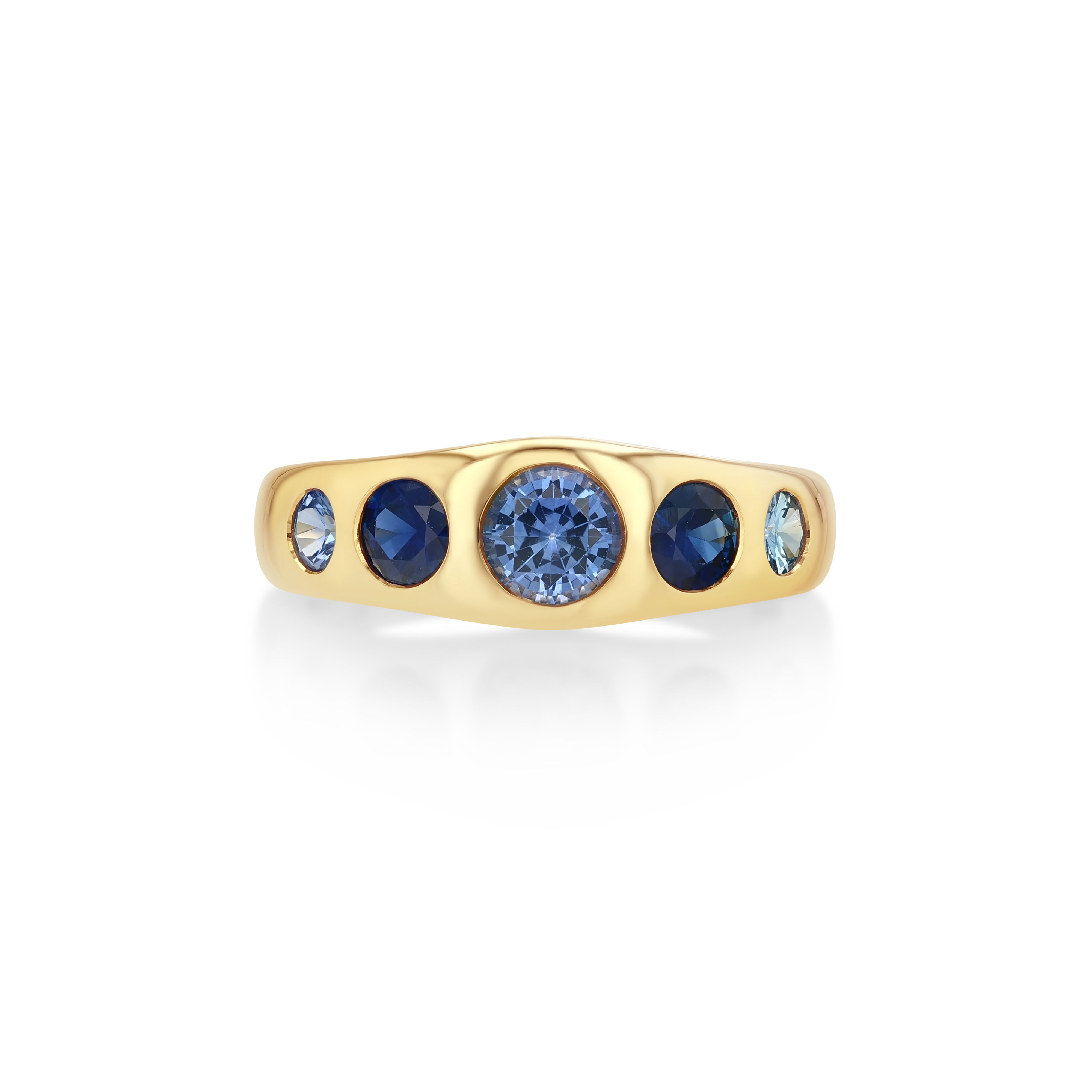 A yellow gold ring featuring a row of round blue gemstones, with a large central deep blue stone and two smaller light blue stones on each side.
