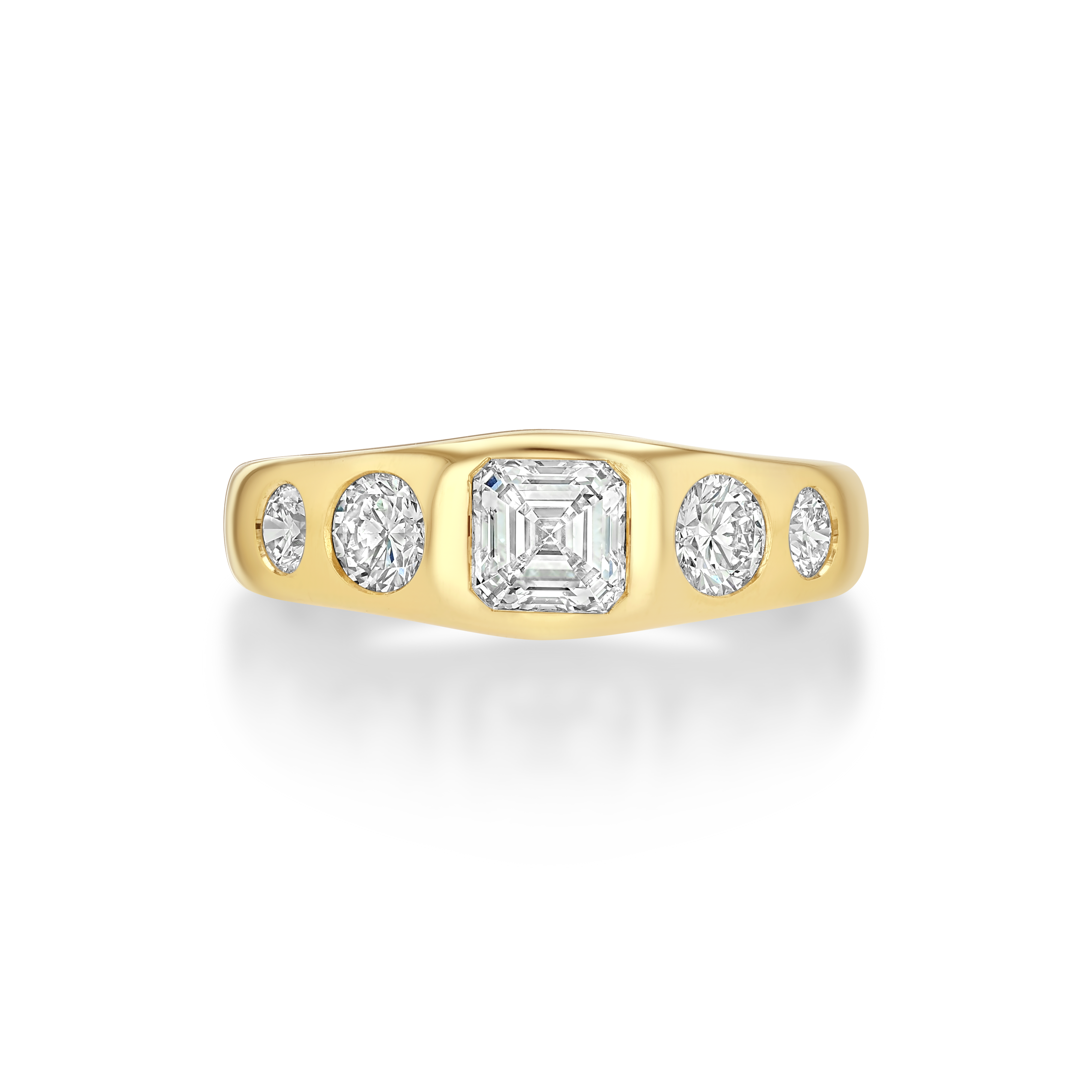 A yellow gold ring featuring a large emerald-cut diamond in the center flanked by four smaller round diamonds.