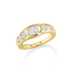 A yellow gold diamond ring with a central emerald-cut diamond and three smaller round diamonds.