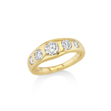 A yellow gold ring featuring five round-cut clear gemstones set in a curved row along the band, shown on a clean white background with a soft reflection.