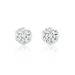 A pair of round brilliant-cut diamond stud earrings in a silver-toned setting, displayed on a clean white background with a soft reflection below.