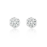 A pair of round brilliant-cut diamond stud earrings in a silver-toned setting, displayed on a clean white background with a soft reflection below.