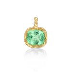 Gold pendant with a green gemstone on a white background