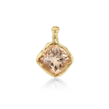 A gold pendant featuring a large, cushion-cut peach-colored gemstone in a textured bezel setting, shown on a clean white background with a soft reflection below.
