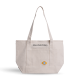 Real Fine Tote — a spacious everyday canvas bag with long shoulder straps, a built-in zipper for securing essentials, and custom embroidery by Abbode in New York. Blue Heirloom embroidery.
