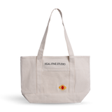 Real Fine Tote — a spacious everyday canvas bag with long shoulder straps, a built-in zipper for securing essentials, and custom embroidery by Abbode in New York. Red Heirloom embroidery. 
